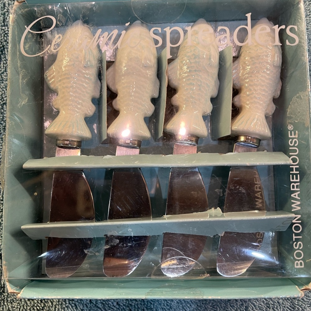 (4) Ceramic White Handled Fish Spreaders by Boston Warehouse Trading Co 2007